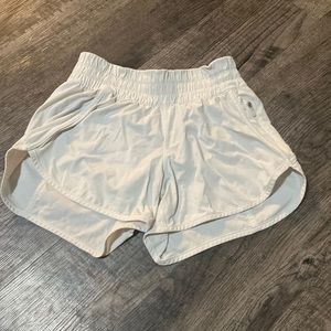 white lululemon shorts
